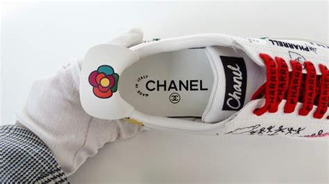 chanel graffiti white|Chanel pharrell street art.